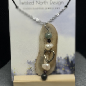 Sheep Horn Slice with Pearl, Garnet, Agate pendant